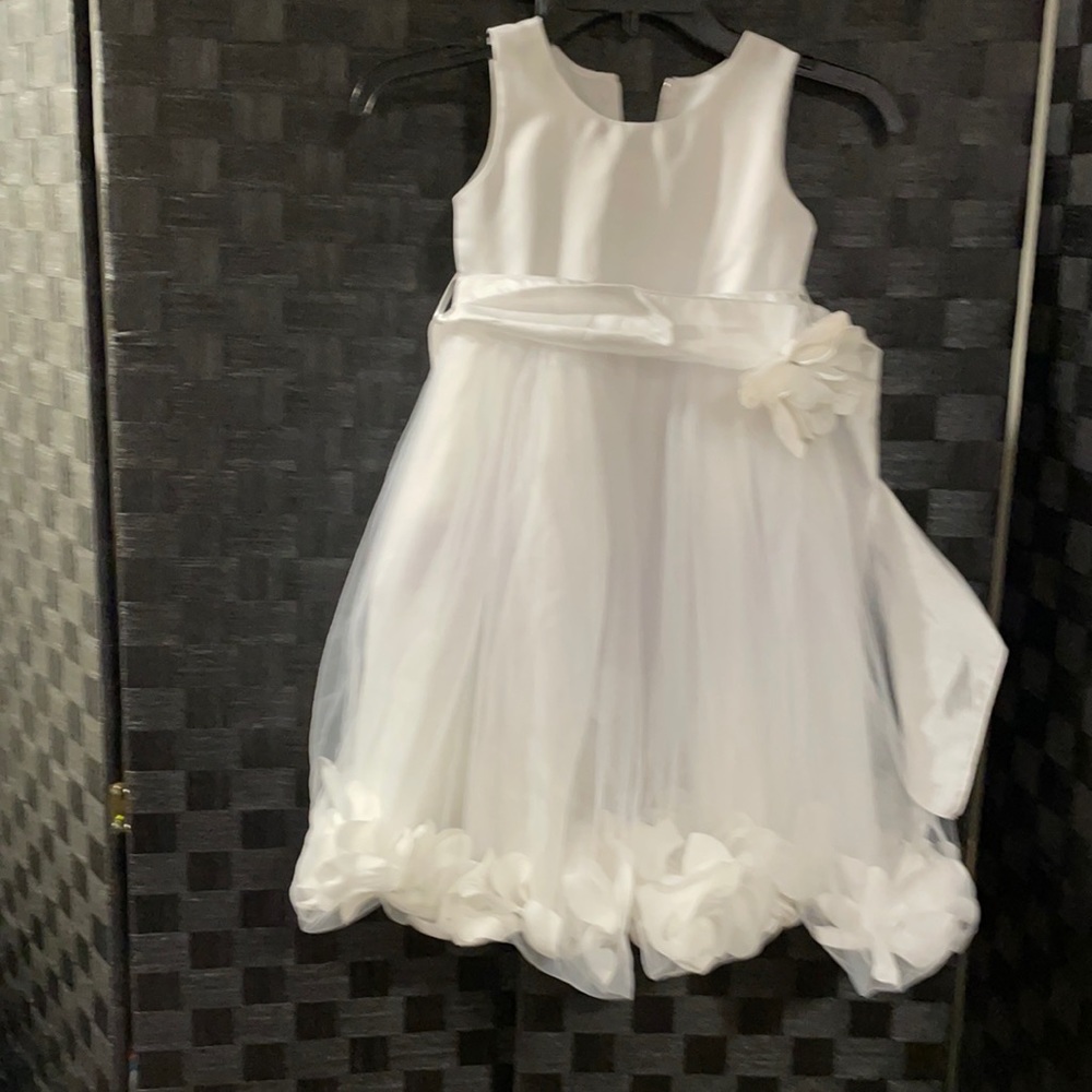 Darling white flower girl dress with bubble hem and flowers